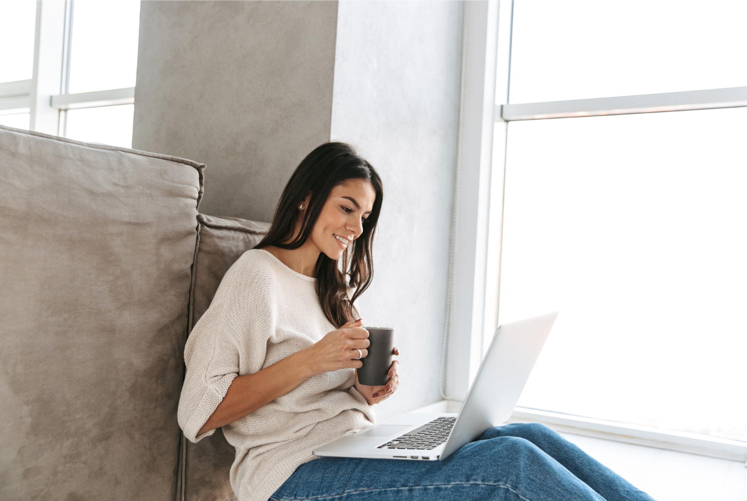 online-christian-counselling-reflective-support-life-relationships-faith Woman using laptop for online Christian counselling session, reflecting on life, relationships, and faith