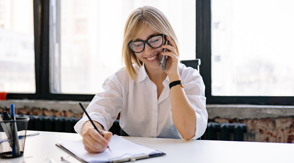 professional reflecting during non-clinical supervision session at desk